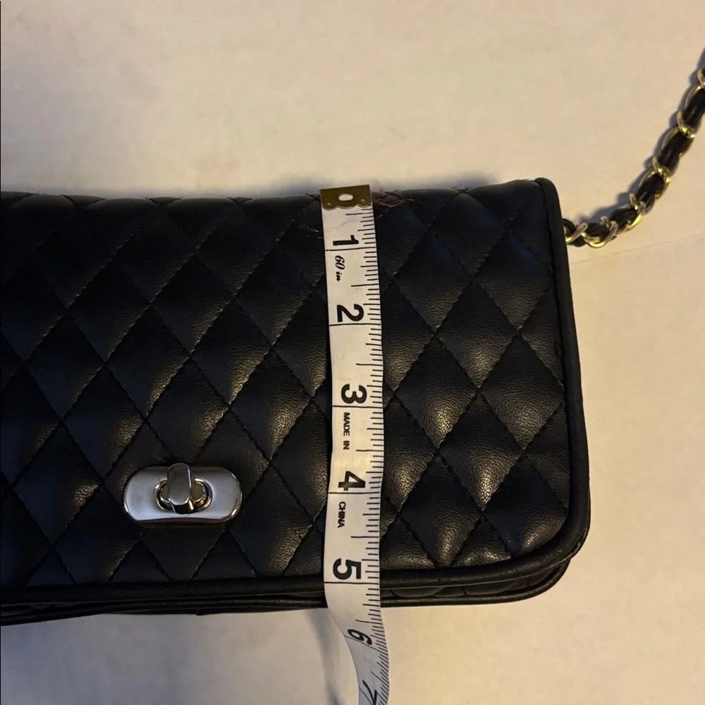 EMPIRE-ORR.INC BRAND BLACK QUILTED FAUX LEATHER CROSSBODY GOLD AND BLACK STRAP